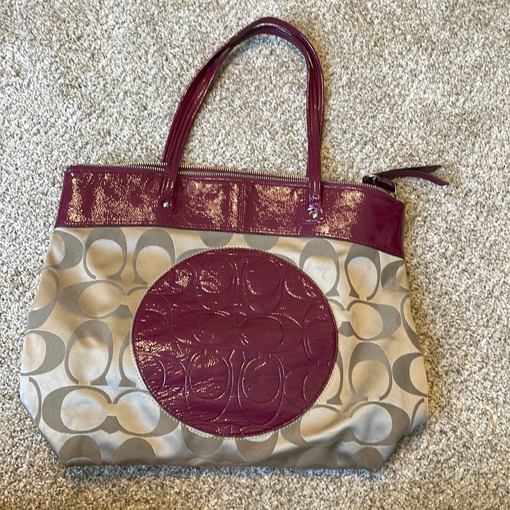 Tan and purple coach shoulder bag